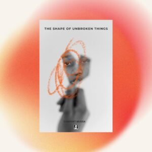 A book cover centered on a vibrant orange gradient background. The white cover displays the English title "THE SHAPE OF UNBROKEN THINGS" at the top and the author name "COMFORT MUSSA" at the bottom above the Bakwa Books publisher logo. The central artwork features a black-and-white blurred portrait of a face partially overlaid with an orange crayon scribble.